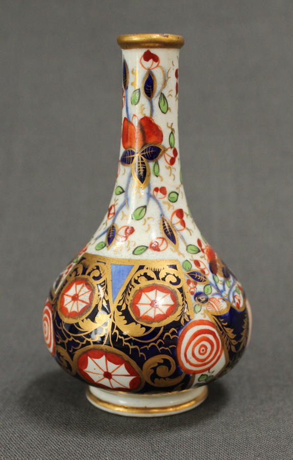 A 19th Century Derby miniature vase