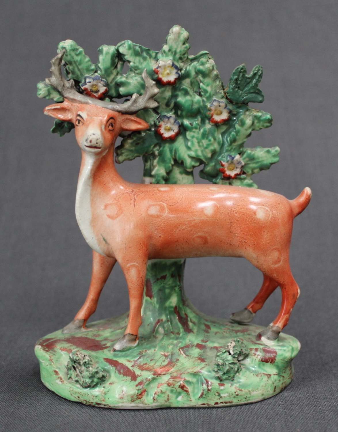 An early 19th Century bocage figure of a deer