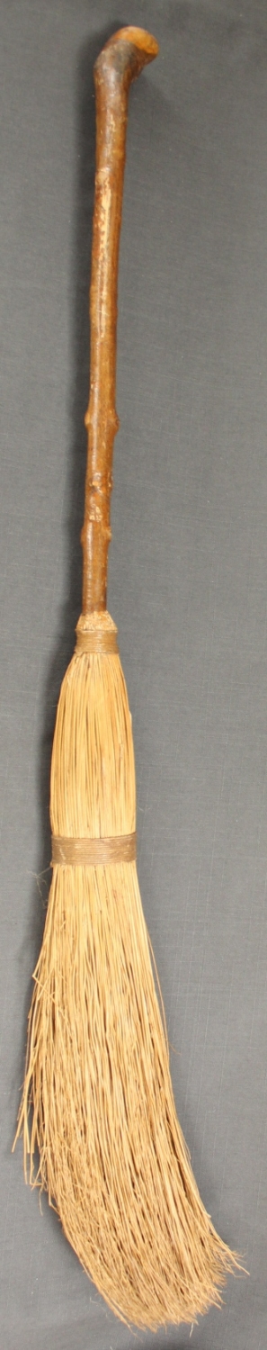 A vintage curling broom