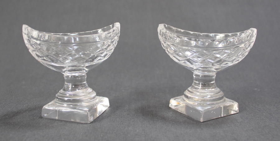 A pair of boat shaped glass salts