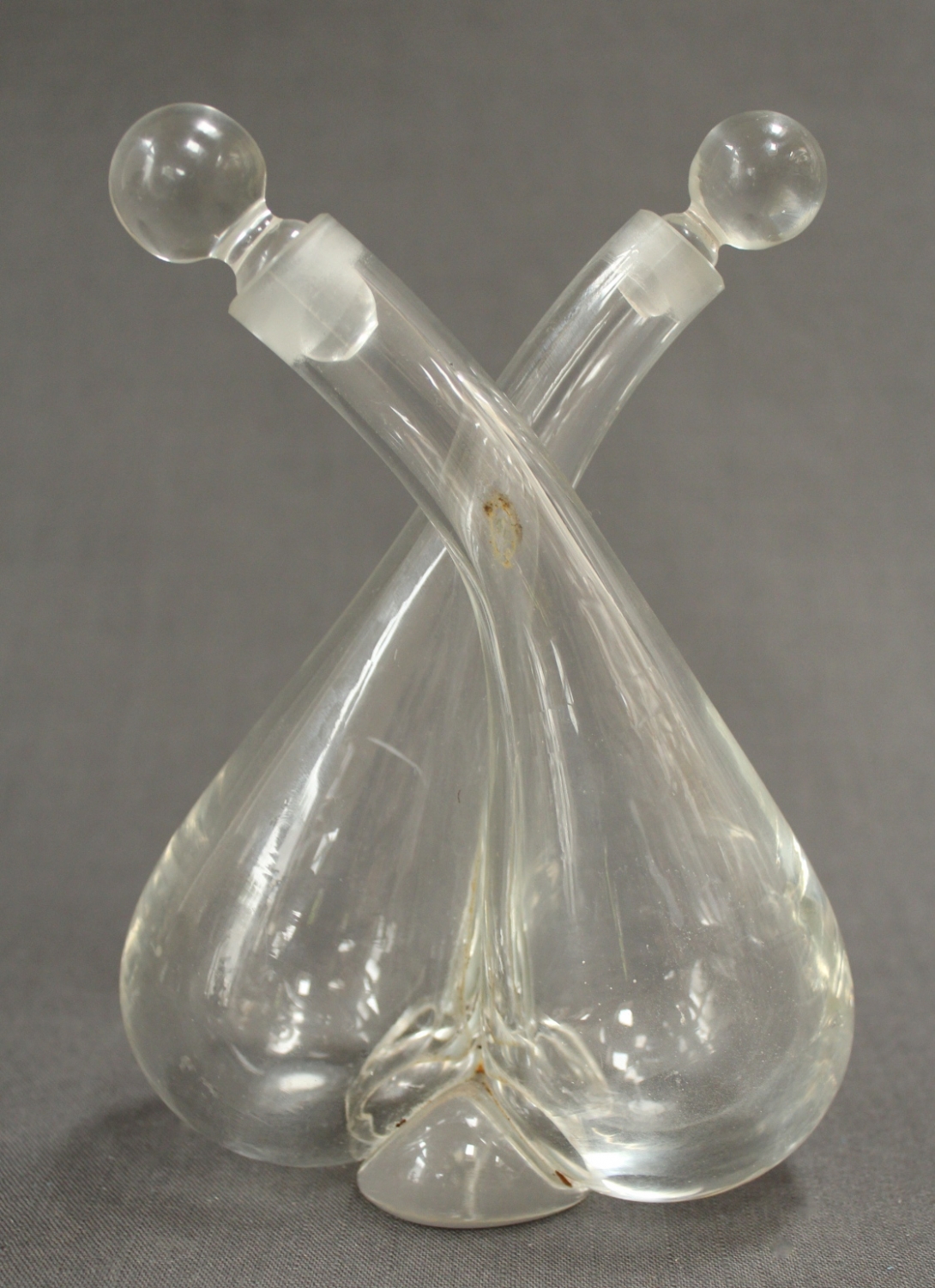 An Edwardian glass cross-over decanter