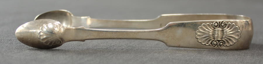 A pair of Geo. III Newcastle silver tongs