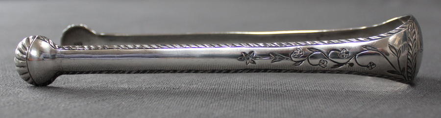 A pair of Scottish silver tongs by A. Zeigler