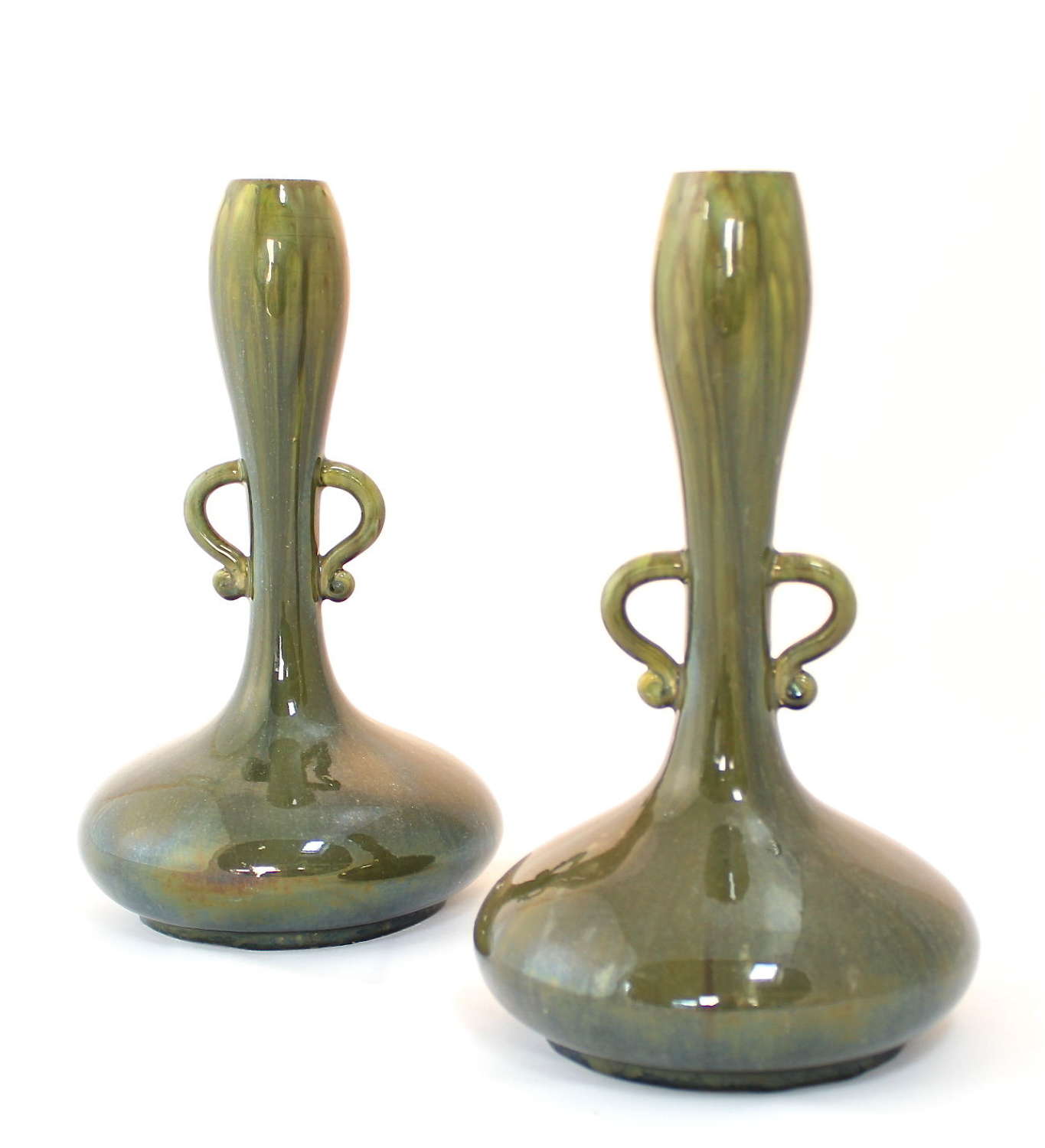 A pair of pottery Dresser style vases